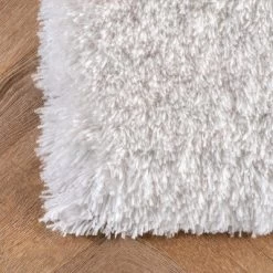 Hand Tufted Kristan Shag Area Rug - NuLOOM 10 Hand Tufted Kristan Shag Area Rug - NuLOOM -Home Decor Store GUEST 77e58a46 c924 4444 91e5 39e4779ed0dc