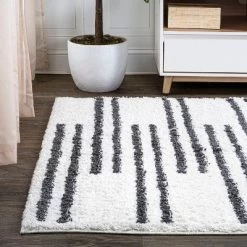 Petra Stripe Geometric Shag Area Rug - JONATHAN Y 16 Petra Stripe Geometric Shag Area Rug - JONATHAN Y -Home Decor Store GUEST d578ace6 c789 4f66 a47f f8907e7d29ba